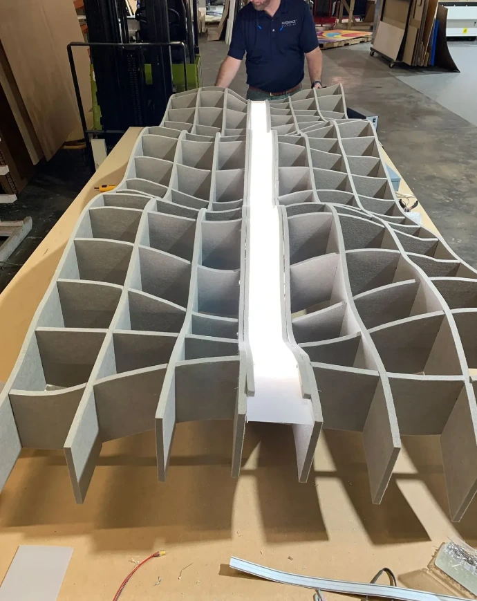 Complex interlocking PET acoustic ceiling structure with integrated linear light